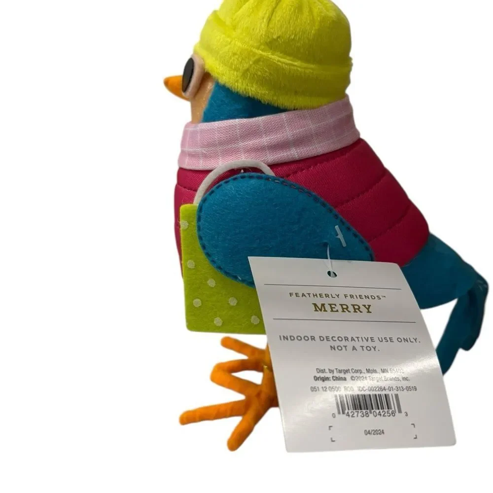 Vibrant Holiday Spritz Bird with Yellow Hat and‎ Pink Scarf